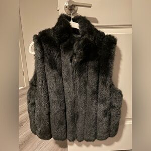 Black fur vest, size women’s medium, never worn once